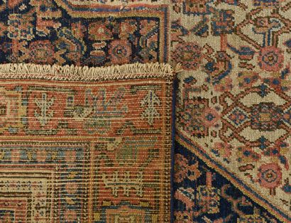 Rectangular polychrome wool carpet with rich...