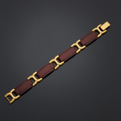 HERMES
Bracelet de cuir acajou alterné de...