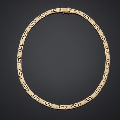 Collier en or jaune 14k, alternant des maillons...