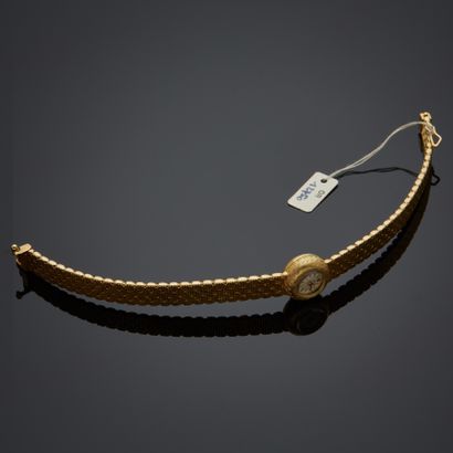 UTI.
Montre bracelet en or jaune 18k, boîtier...