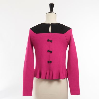 SONIA RYKIEL. 
Pull de couleur rose et noir...