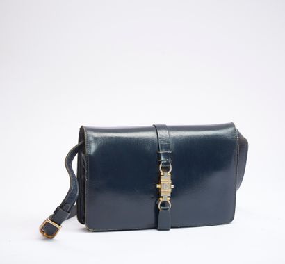 CELINE.
Pochette à bandoulière, trois compartiments...