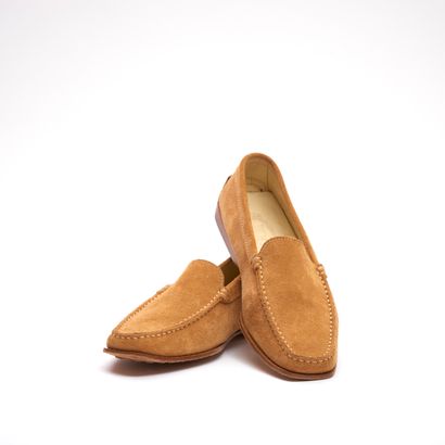 Tod's. 
Paire de mocassins en daim cognac...