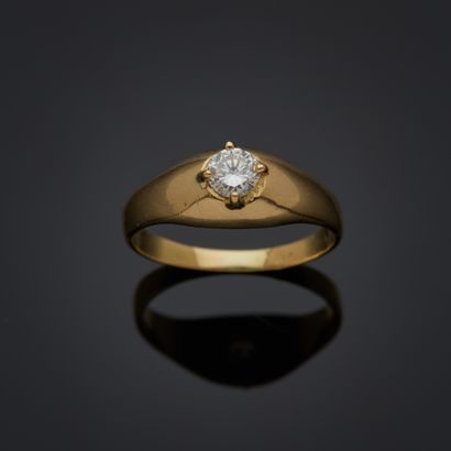 Bague en or jaune 18k sertie d'un diamant...