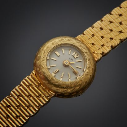 UTI.
Montre bracelet en or jaune 18k, boîtier...