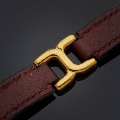 HERMES
Bracelet de cuir acajou alterné de...