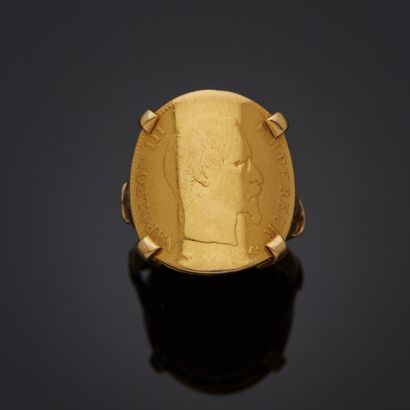 Bague en or jaune 18k sertie d'une pièce...