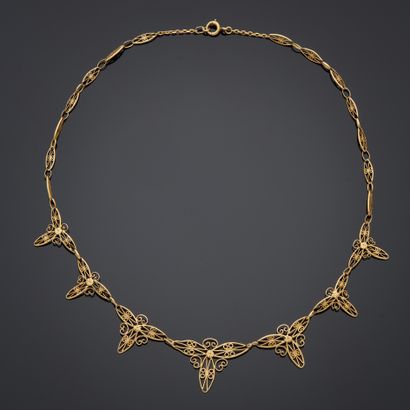 Collier draperie en or jaune 18k à maille...
