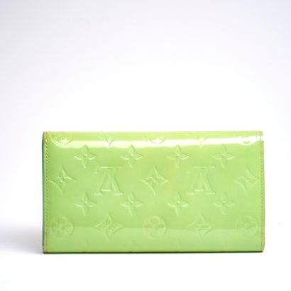 LOUIS VUITTON.
Porte carte, porte monnaie,...
