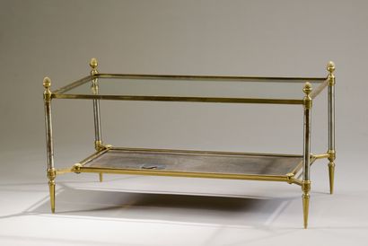 Maison JANSEN.
Table basse en verre, acier...
