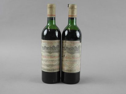 2 bouteilles CH. CALON-SEGUR, 3° cru Saint-Estèphe...