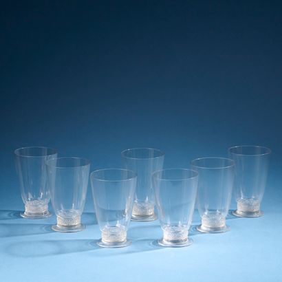 LALIQUE, France.
Suite of seven water glasses...