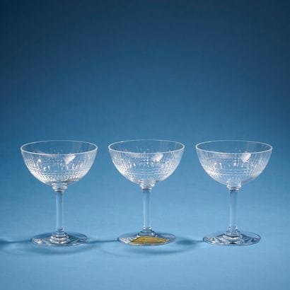BACCARAT.
Trois coupes à Champagne en cristal...