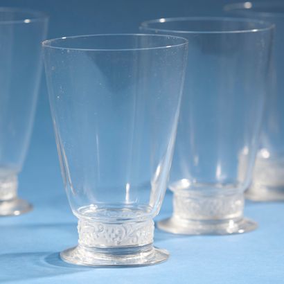 LALIQUE, France.
Suite of seven water glasses...