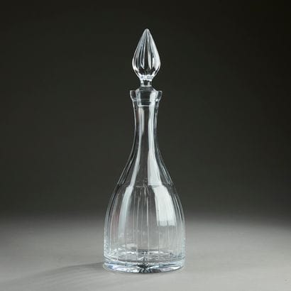 BACCARAT. 
Piriform wine decanter in striated...
