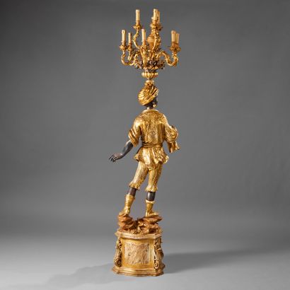 Wooden torch holder carved with a Nubian...