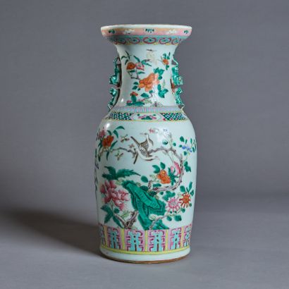 Octagonal low pedestal in richly carved wood...