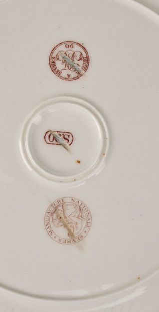 Porcelain plate enameled with foliage, scrolls...