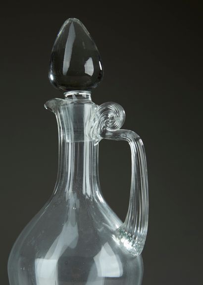 Pair of baluster ewers in blown glass, the...