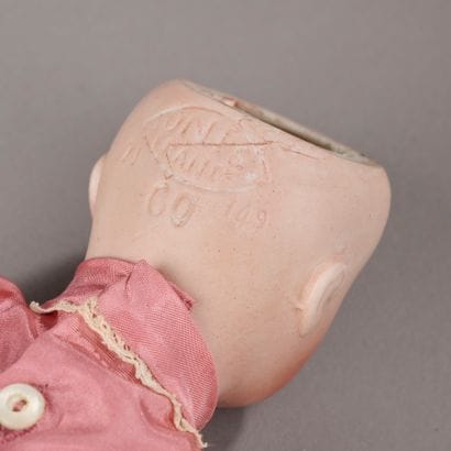 UNIS France

Petite poupée, tête en biscuit,...