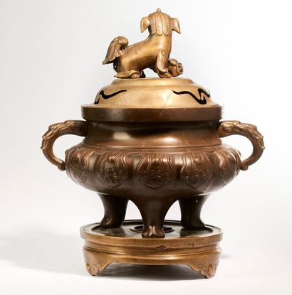 CHINA.

Large tripod incense burner in brown...