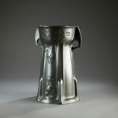 KAYSERZINN.

Large repoussé pewter vase of...