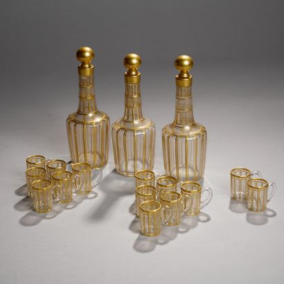 Suite of three decanters and fourteen liqueur...