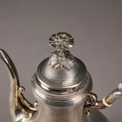 A 950 thousandth guilloche silver coffee...