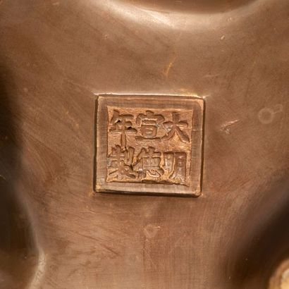 CHINA.

Large tripod incense burner in brown...