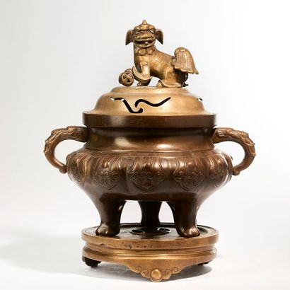 CHINA.

Large tripod incense burner in brown...