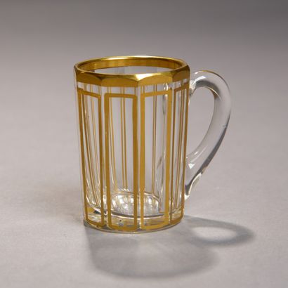 Suite of three decanters and fourteen liqueur...