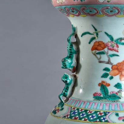 Octagonal low pedestal in richly carved wood...