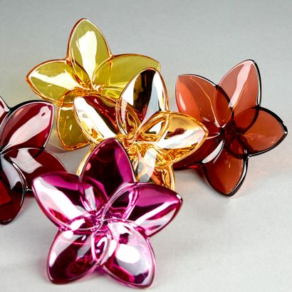 BACCARAT.
Set of five tinted crystal flowers,...