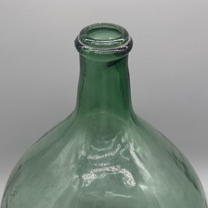Dame-Jeanne in blown, green-tinted glass...