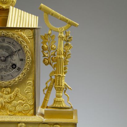 Chased and gilt bronze clock. The silvered...