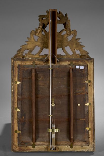 TORICELLI barometer. 
The gilded wood frame...