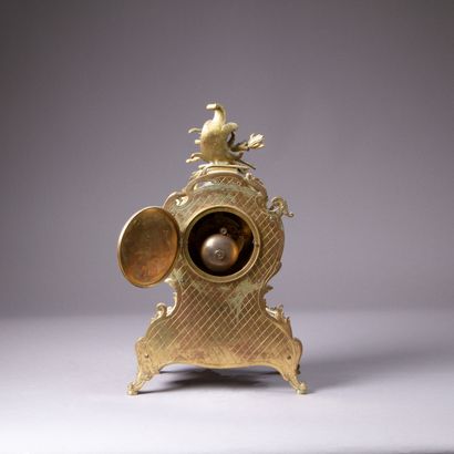 Chased and gilded bronze mantel set composed...