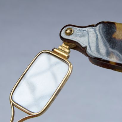 Three pairs of glasses or binoculars, mounted...