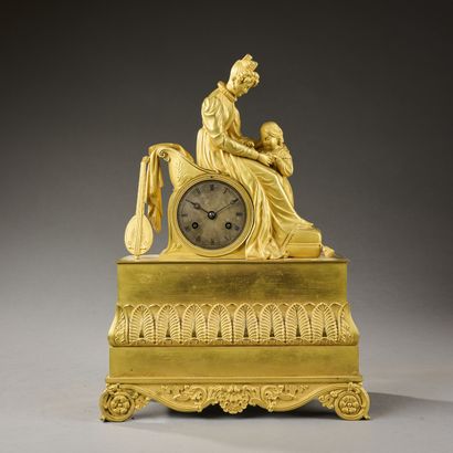 Gilt bronze, gilded and chased clock (scratches,...