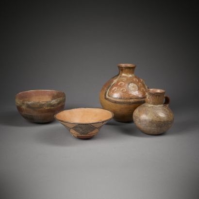 Set of four terracotta pieces painted with...