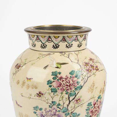 Pair of polychrome enameled porcelain vases...