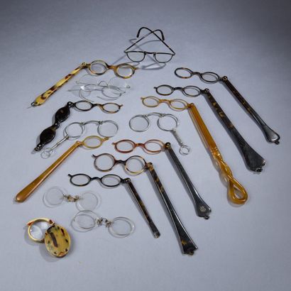 Three pairs of glasses or binoculars, mounted...