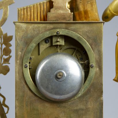 Chased and gilt bronze clock. The silvered...