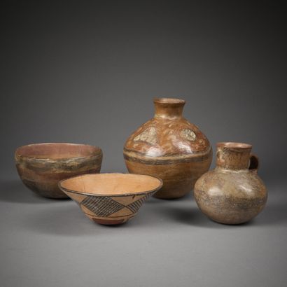 Set of four terracotta pieces painted with...
