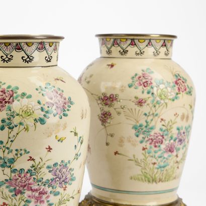 Pair of polychrome enameled porcelain vases...