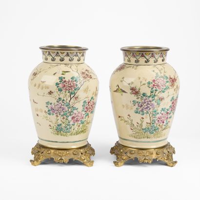 Pair of polychrome enameled porcelain vases...