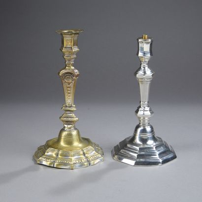 Two silver-plated bronze torches (one unsilvered,...