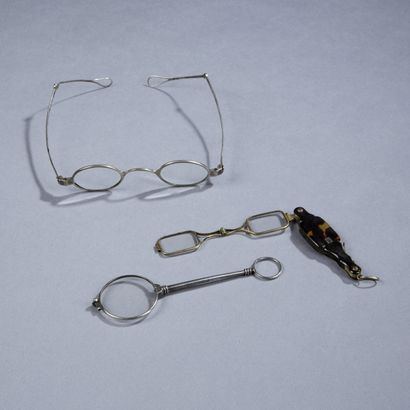Three pairs of glasses or binoculars, mounted...