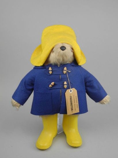 Ours PADDINGTON en peluche, vêtu d'un duffle-coat...