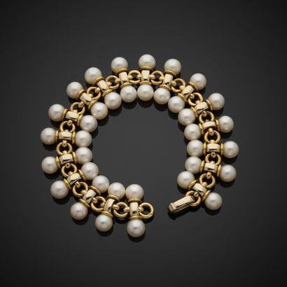Bracelet en or jaune et gris 750 millièmes,...